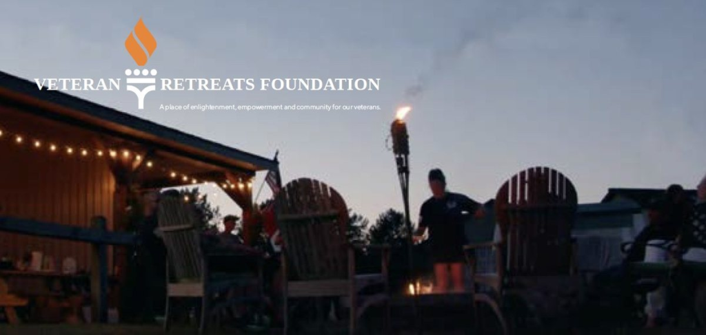 veteran-retreats-foundation-campfire Veterans gather around a fire pit at a Veteran Retreats Foundation retreat